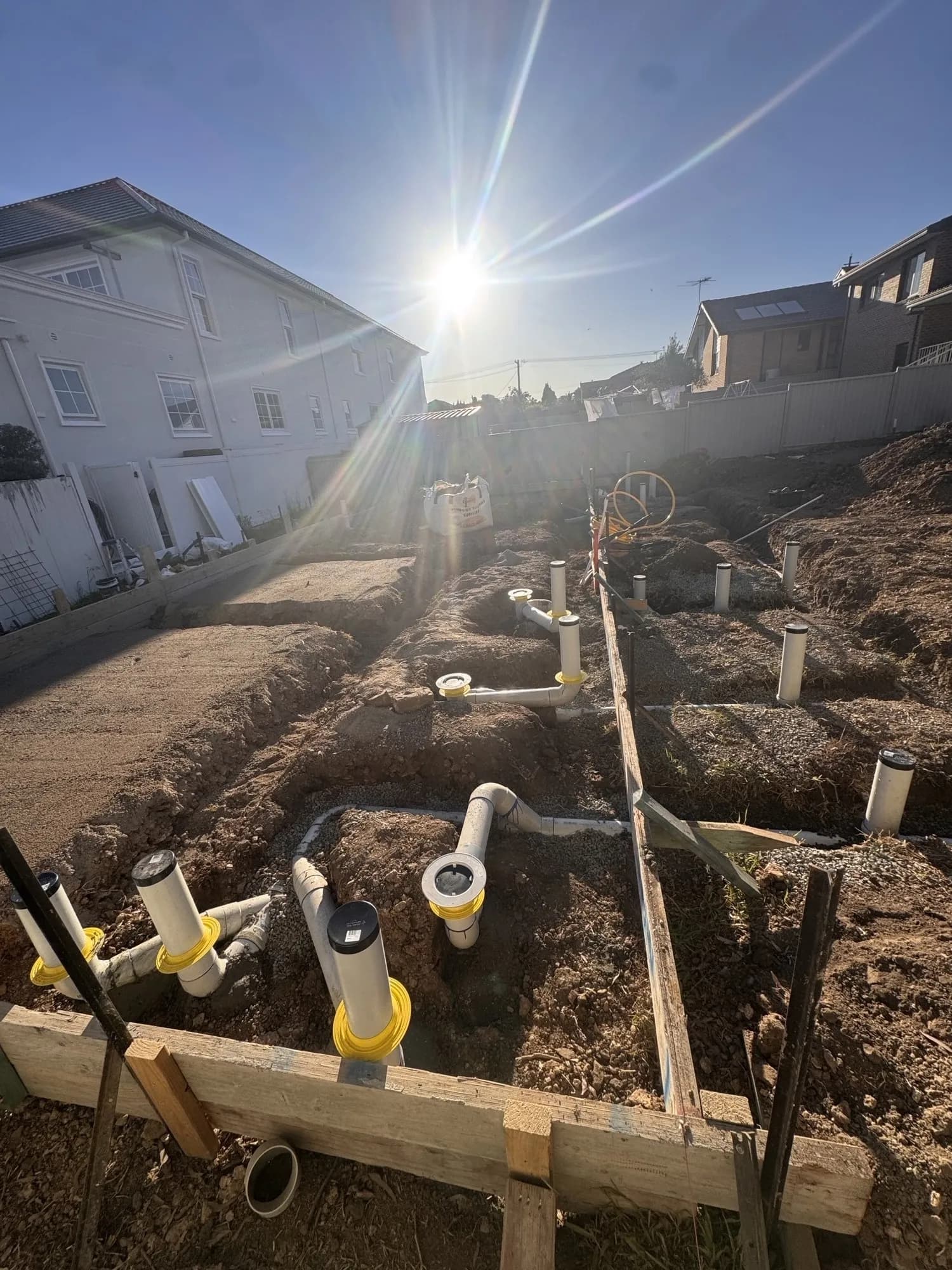 Sewer drainage risers set within the granny flat's slab formwork